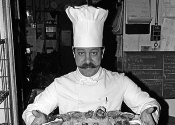  Chef with oysters   -   Oak Park, IL, 1983   -   Kodak Tri-X black & white 35mm film