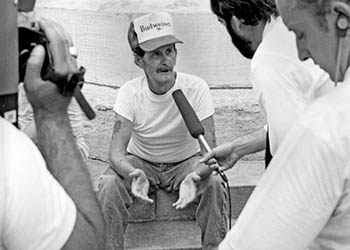 Man being interviewed   -   LaSalle, IL, 1983   -   Kodak Plus-X black & white 35mm film