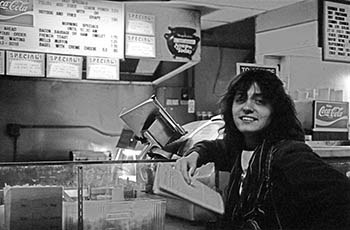 Susan at sandwich counter   -   Chicago, 1985   -   Kodak Tri-X black & white 35mm film