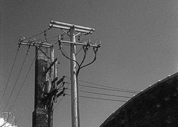 Alley utility poles   -   Oak Park, IL, 1982   -   Kodak infrared black & white 35mm film