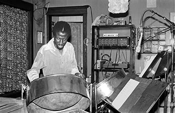 Clyde with steel drums No. 2   -   Oak Park, IL, 1983   -   Kodak Tri-X black & white 35mm film