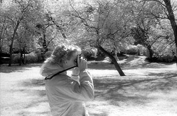 Amy taking pictures   -    Oak Park, IL, 1983   -   Kodak infrared black & white 35mm film