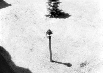 Courtyard lamp post   -   Oak Park, IL, 1982   -   Kodak infrared black & white 35mm film