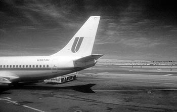 Jet airliner tail   -   New York City, 1985   -   Kodak infrared black & white 35mm film