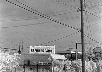 Refiners Pride & utility pole   -   Forest Park, IL, 1982   -   Kodak infrared black & white 35mm film